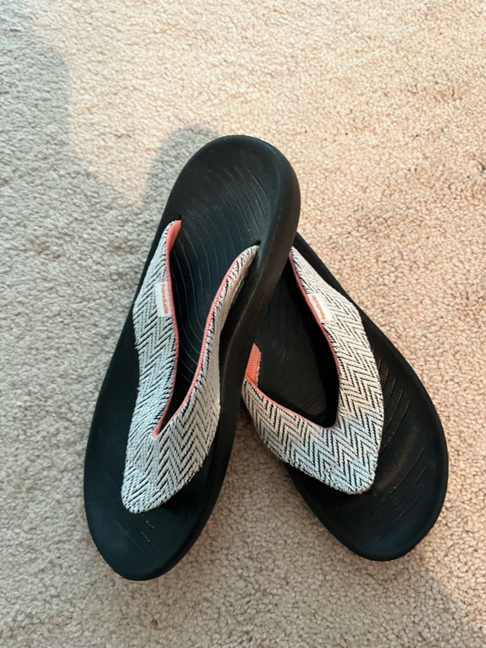 Hey Dude Black Sandal with White Chevron Straps and Coral Trim